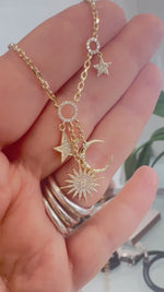 Load and play video in Gallery viewer, Multicharm Moon, Sun, and Stars Diamond Necklace
