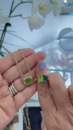 Load and play video in Gallery viewer, Emerald Cut Peridot Bezeled Pendant Necklace
