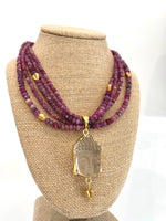 Load image into Gallery viewer, Buddha Namaste Necklace with Ruby
